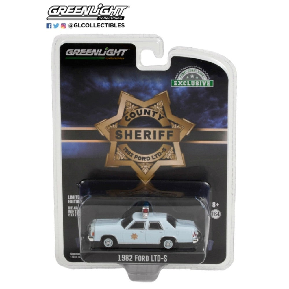 THIS ITEM IS AVAILABLE TO ORDER FROM OUR SUPPLIER - 1/64 GREENLIGHT GL30304 1982 FORD LTD-S COUNTY SHERIFF (HOBBY EXCLUSIVE)