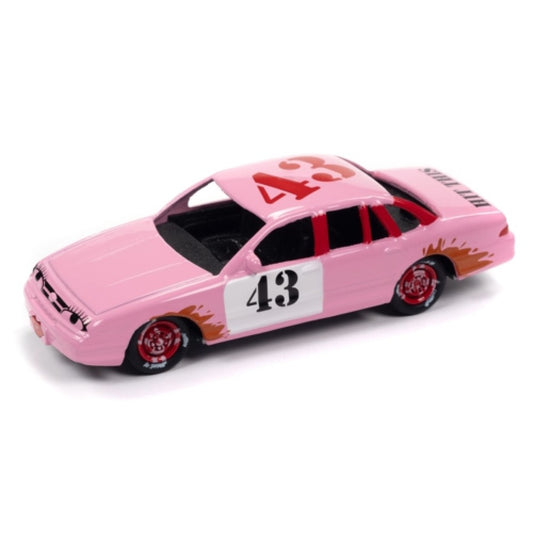 1/64 JOHNNY LIGHTNING JLSF025A-4 STREET FREAKS 1997 FORD CROWN VICTORIA DEMOLITION DERBY COTTON CANDY PINK WITH DERBY GRAPHICS