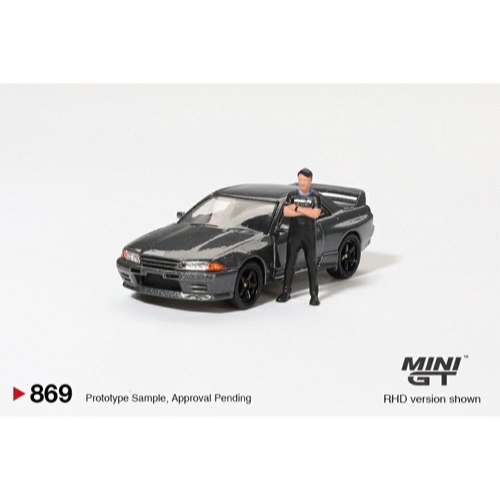 PRE ORDER STOCKS DUE JULY /AUGUST 2025 1/64 MINI GT MGT00869-R NISSAN SKYLINE GT-R (R32) NISMO GUNMETAL W/MATSUDA FIGURE (RHD)